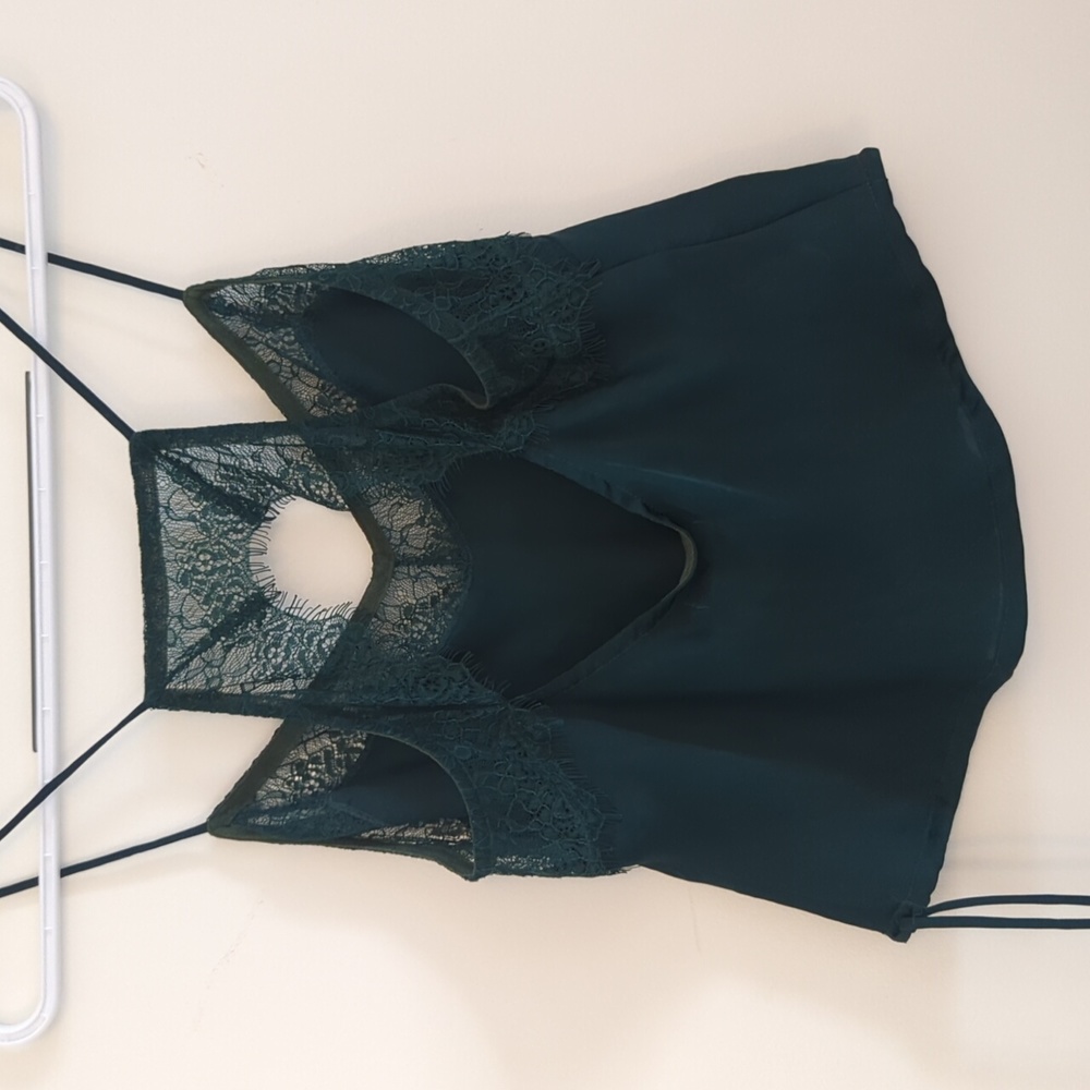Satiny lace trimmed cutout tank